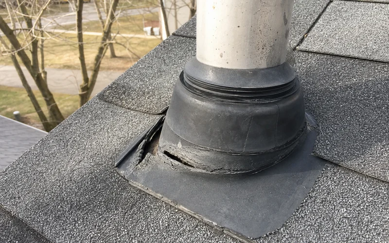 Cracked rubber vent boot on a Hartford County residential roof